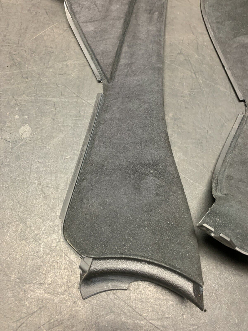 2004 PONTIAC GTO OEM BLACK SUEDE CENTER CONSOLE SIDE PANEL TRIM