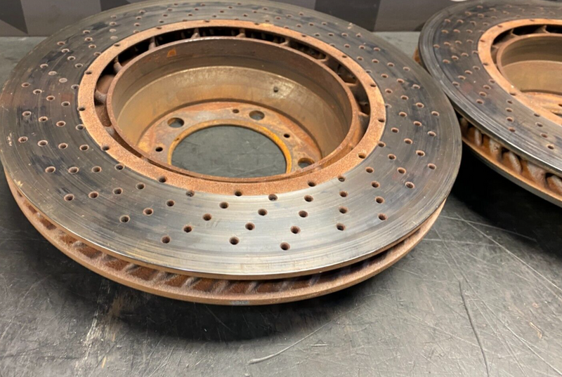 2004 PORSCHE 911 GT3 OEM REAR STEEL BRAKE ROTORS DRILLED USED