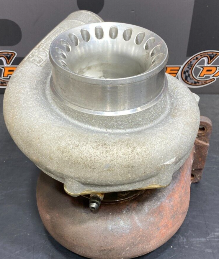 PRECISION TURBO 6466 T4 DIVIDED 1.0 AR TURBINE HOUSING 21304210249 USED LOW MILE