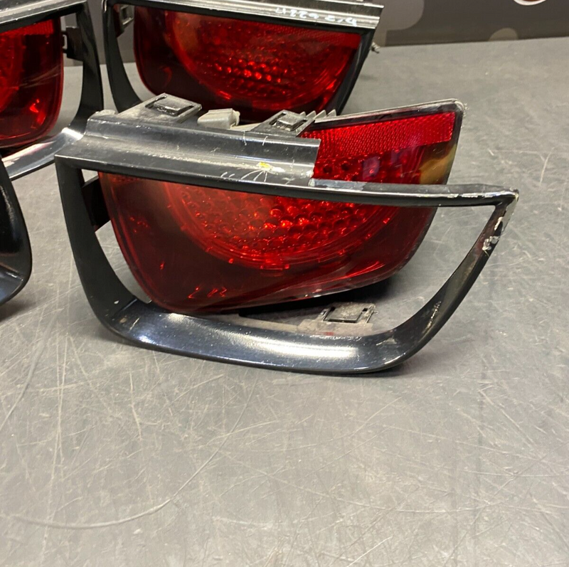 2010 CHEVROLET CAMARO SS OEM TAIL LIGHT WITH BEZEL SET USED