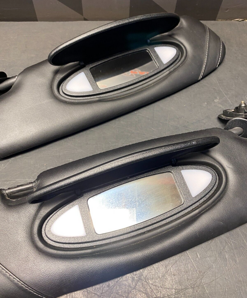 2004 PORSCHE 911 GT3 OEM BLACK LEATHER VISORS PAIR DR PS USED **SEE PICS**