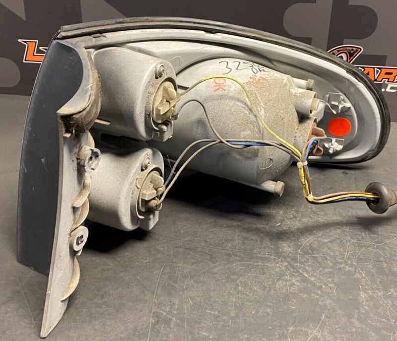 2006 PONTIAC GTO OEM DRIVER LH TAIL LIGHT TAIL LAMP USED **SEE PICS**