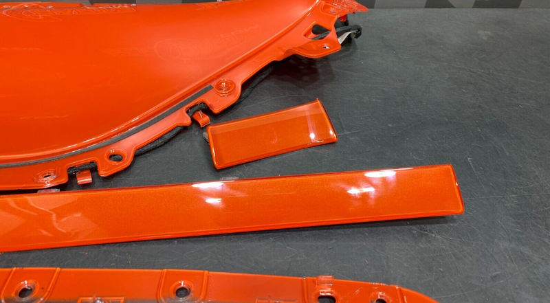 2010 CAMARO SS COUPE OEM ORANGE STITCHED DOOR PANEL ARM REST PAIR DR PS USED