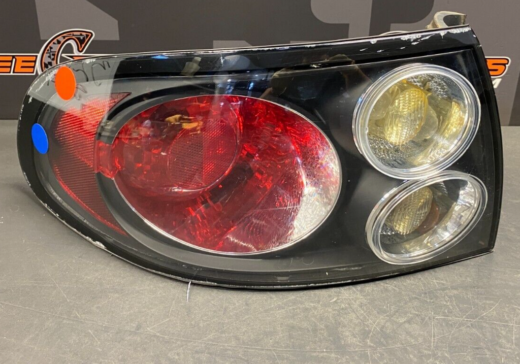2006 PONTIAC GTO OEM DRIVER LH TAIL LIGHT TAIL LAMP USED **SEE PICS**