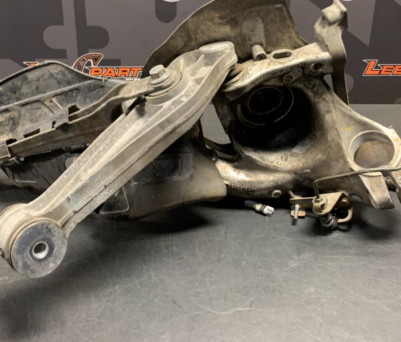 2007 PORSCHE 911 TURBO OEM DRIVER FRONT HUB KNUCKLE CONTROL ARM KNEE ASSY AWD