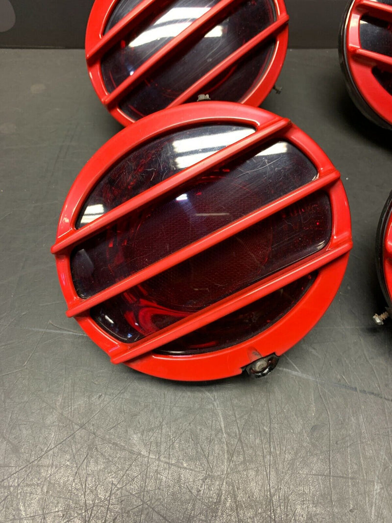 2007 CORVETTE C6 OEM TAIL LIGHTS W/ RED GRILLES