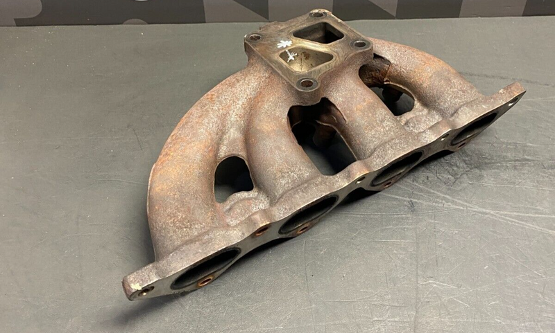 2006 MITSUBISHI LANCER EVO9 OEM STOCK TURBO MANIFOLD HEADER USED **SEE PICS**