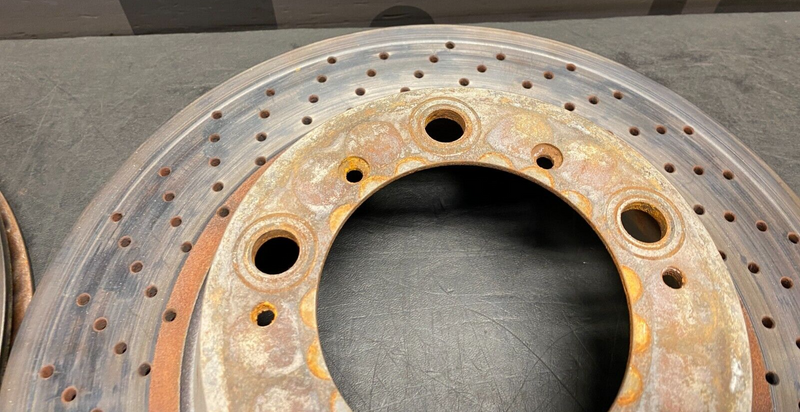 2004 PORSCHE 911 GT3 OEM REAR STEEL BRAKE ROTORS DRILLED USED