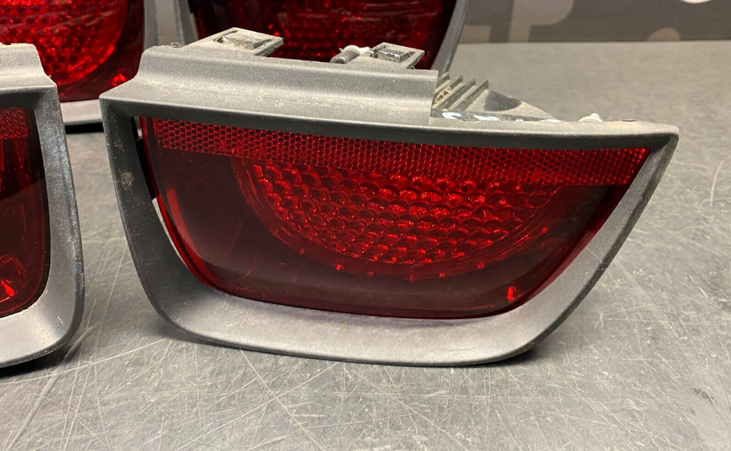 2010 CHEVROLET CAMARO SS OEM TAIL LIGHT ASSEMBLY WITH TRIM RING BEZELS USED