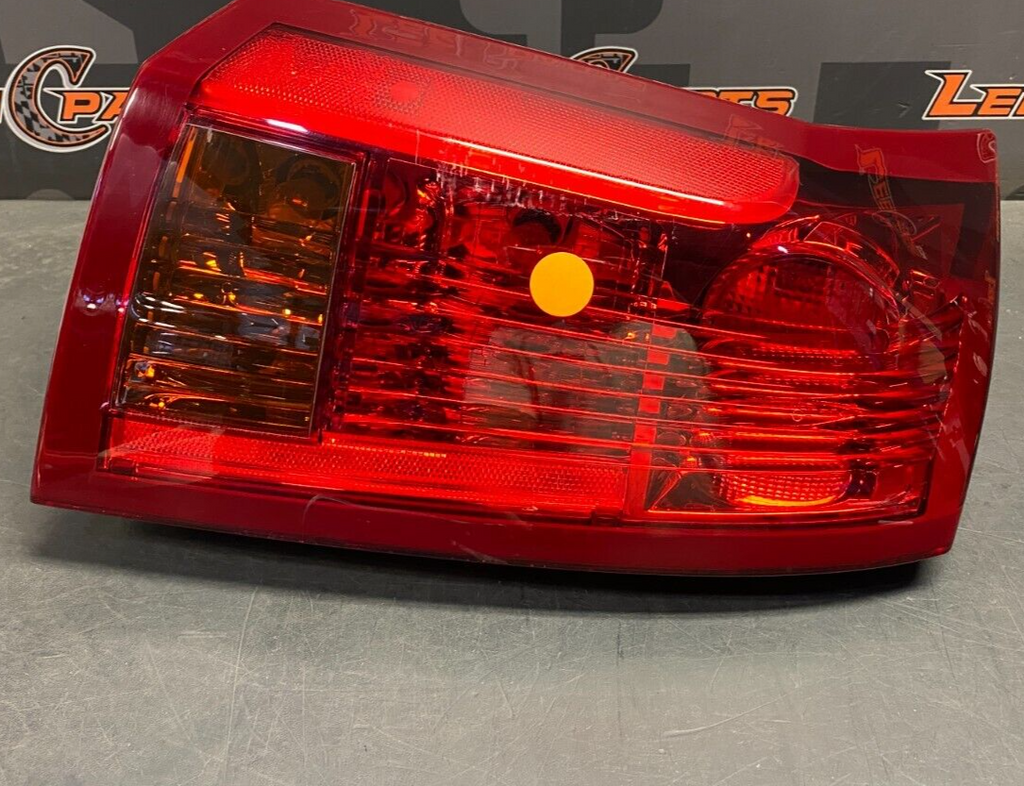 2005 CADILLAC CTS V CTS-V OEM DRIVER LH REAR TAIL LIGHT USED **SCUFF**