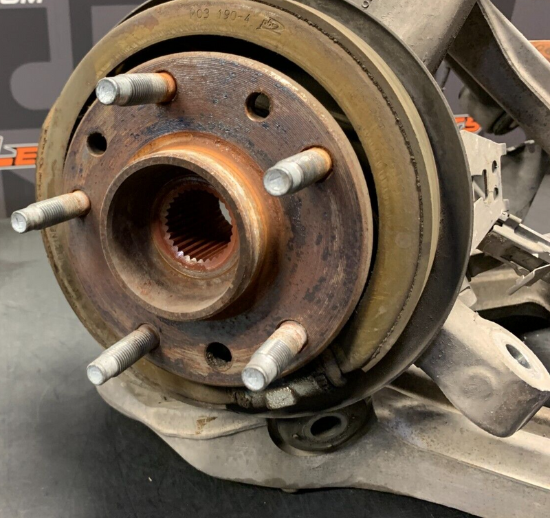 2001 CORVETTE C5 OEM DRIVER REAR CORNER HUB KNUCKLE USED