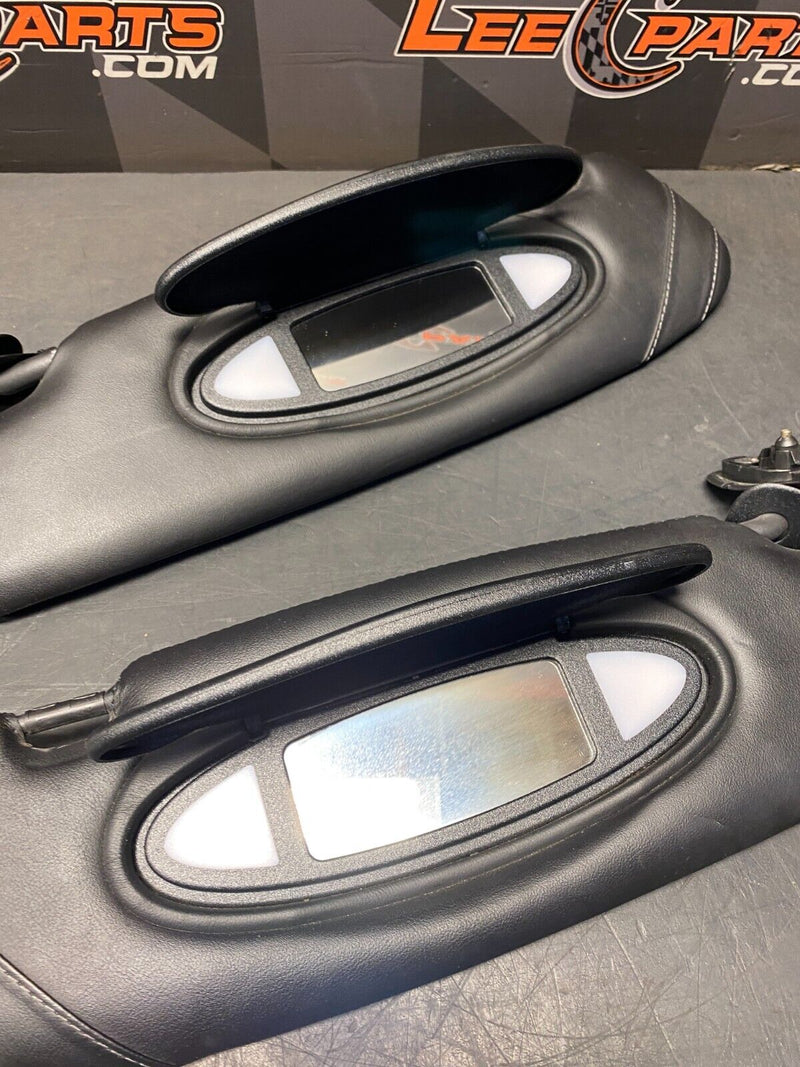2004 PORSCHE 911 GT3 OEM BLACK LEATHER VISORS PAIR DR PS USED **SEE PICS**