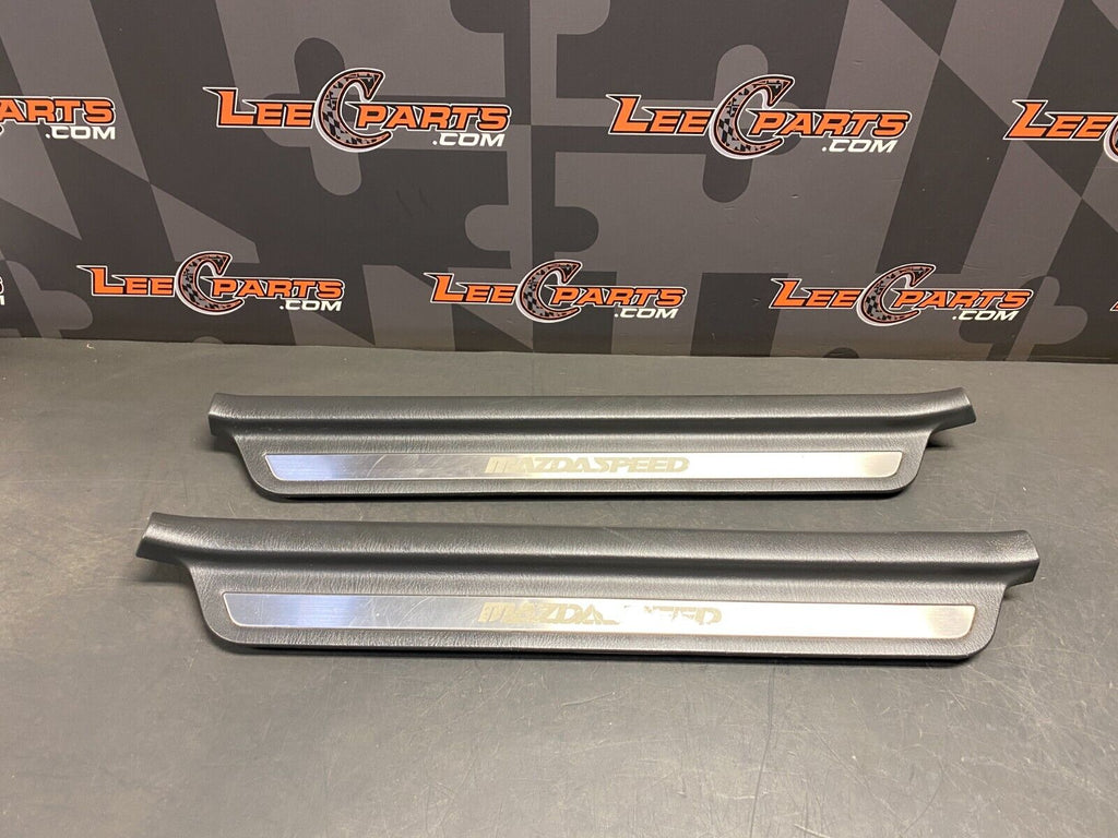 2003 MAZDASPEED PROTEGE OEM SIDE SILL KICK PANELS PAIR DR PS USED